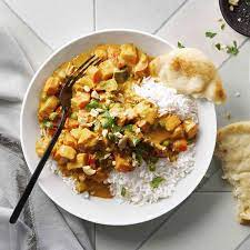 Mix veg korma with rice: mixed vegetables, creamy curry, rice, North Indian cuisine, vegetarian